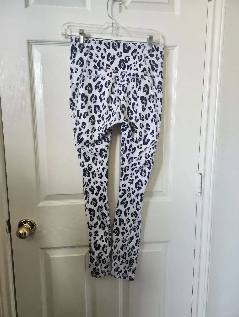 Fabletics Oasis White Leopard Print Leggings - Black Spot Pattern
